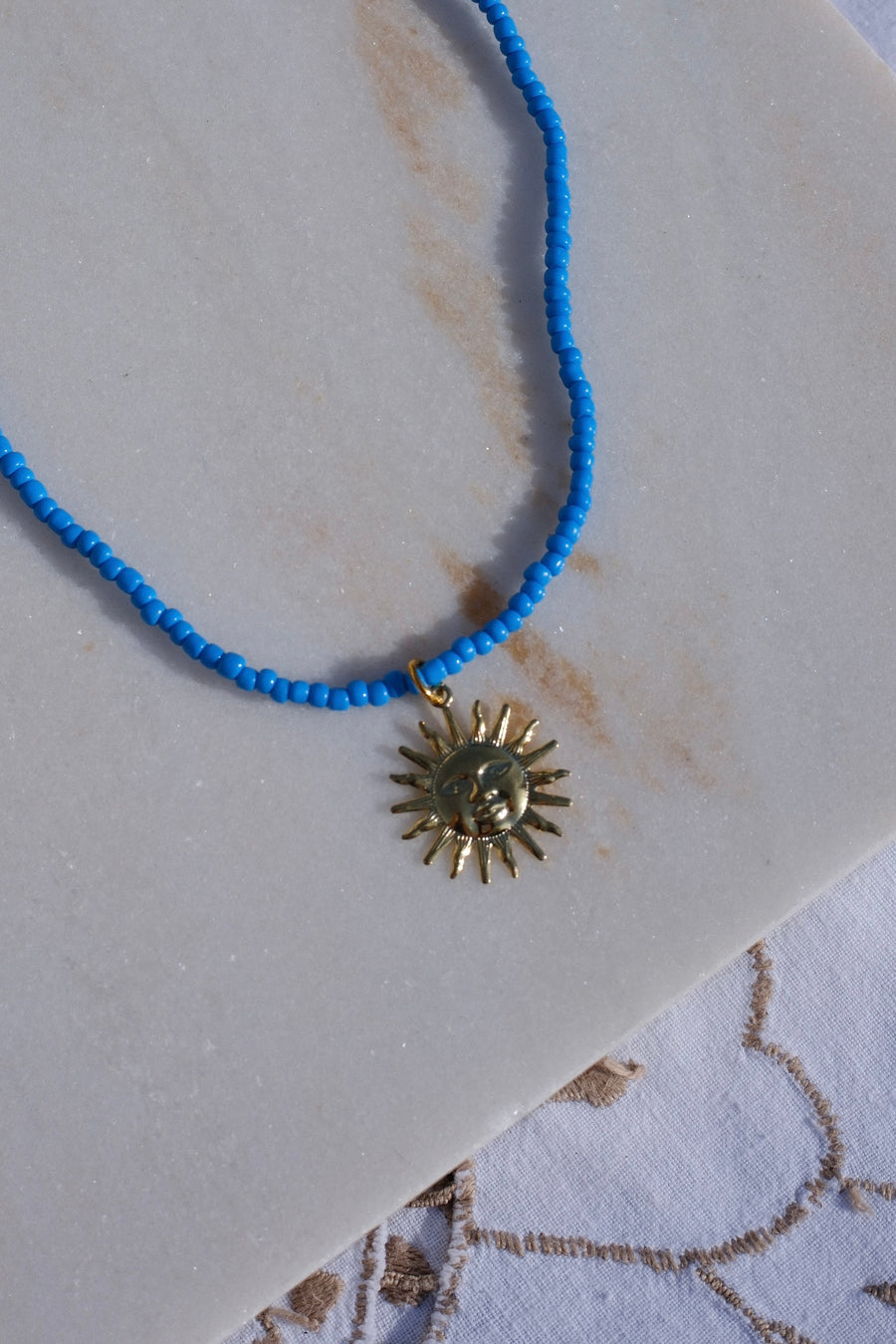 Blue Beaded Sun Necklace