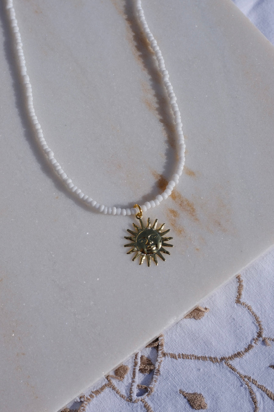 White Beaded Sun Necklace