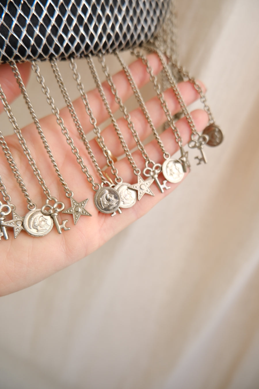 Chain & Charm Tassel Bag