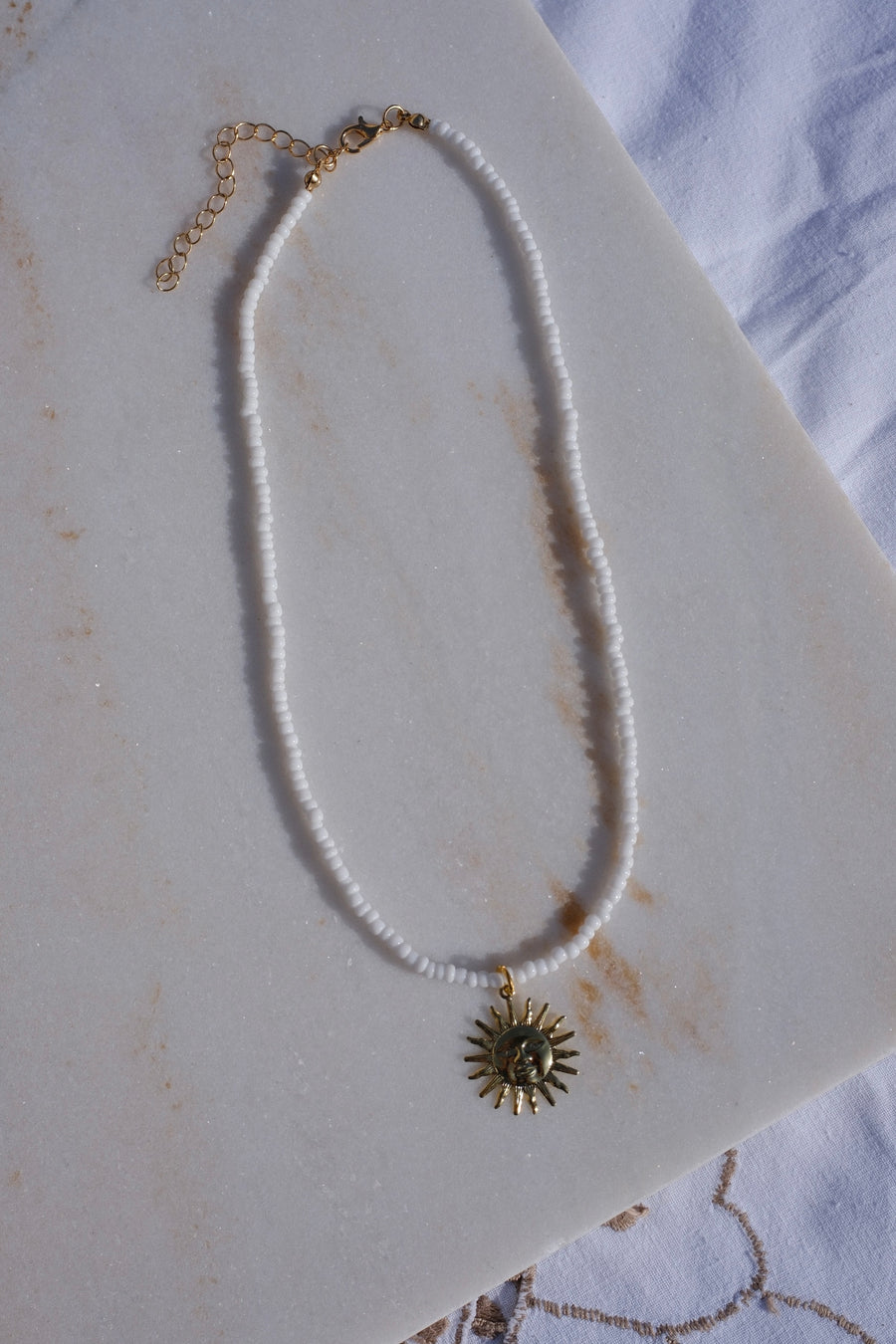 White Beaded Sun Necklace